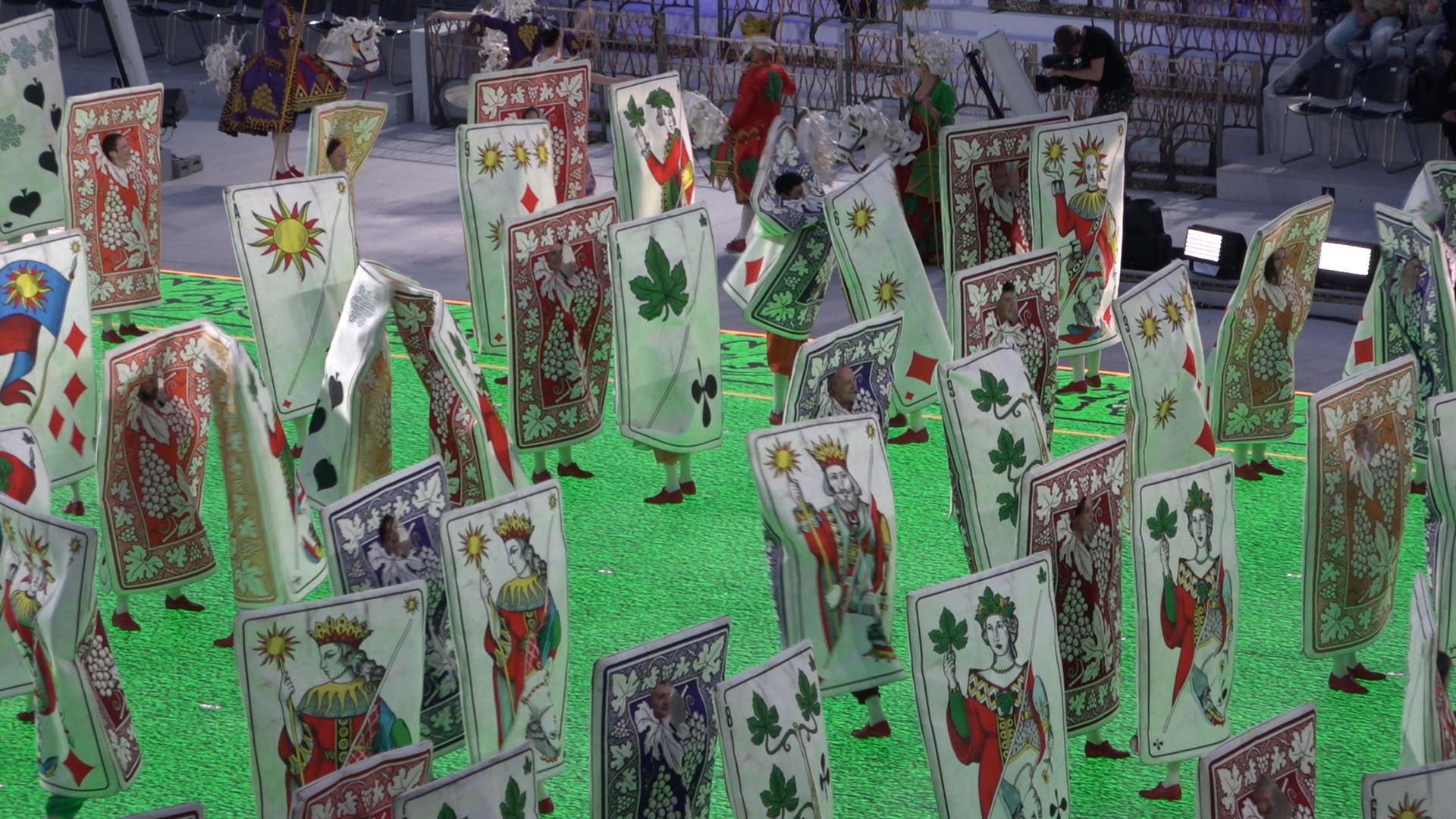 People dressed as cards dancing