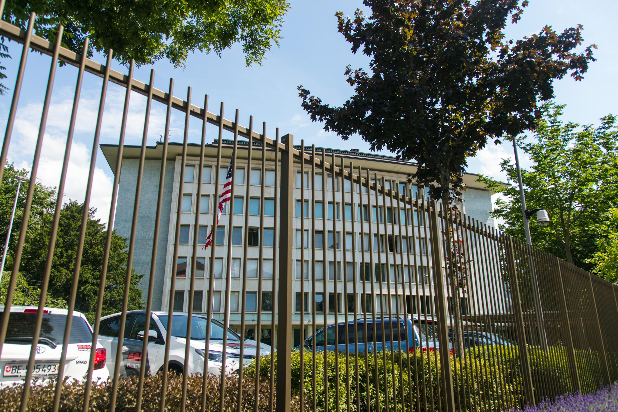 large building behind security fence