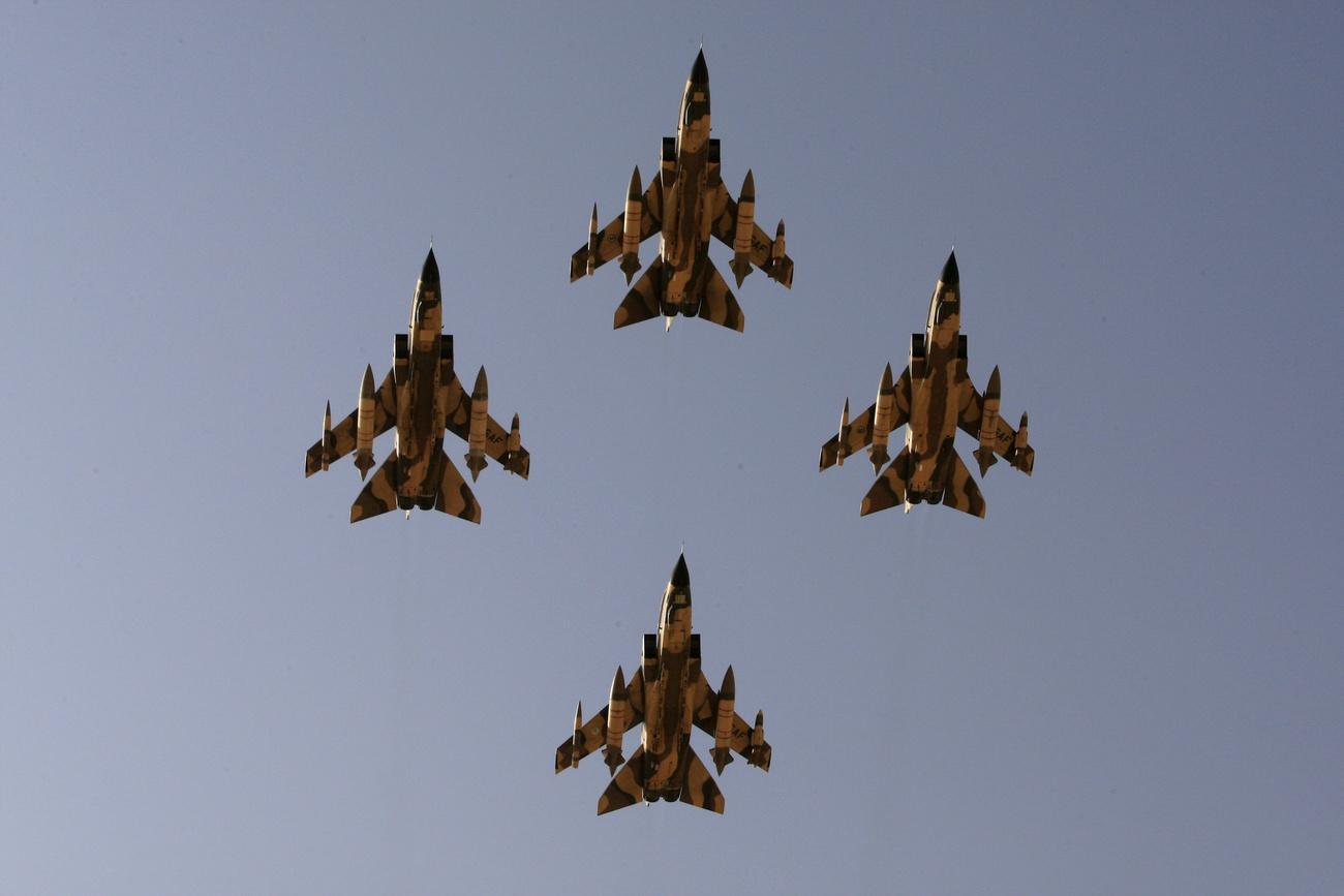 Saudi warplanes fly over the capital Riyadh during a graduation ceremony in 2009