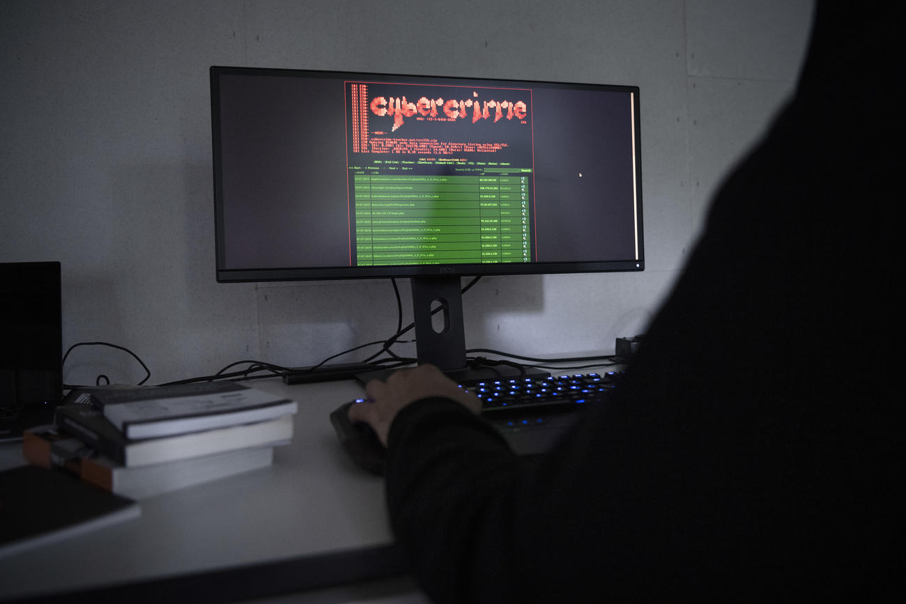 Man in front of a computer