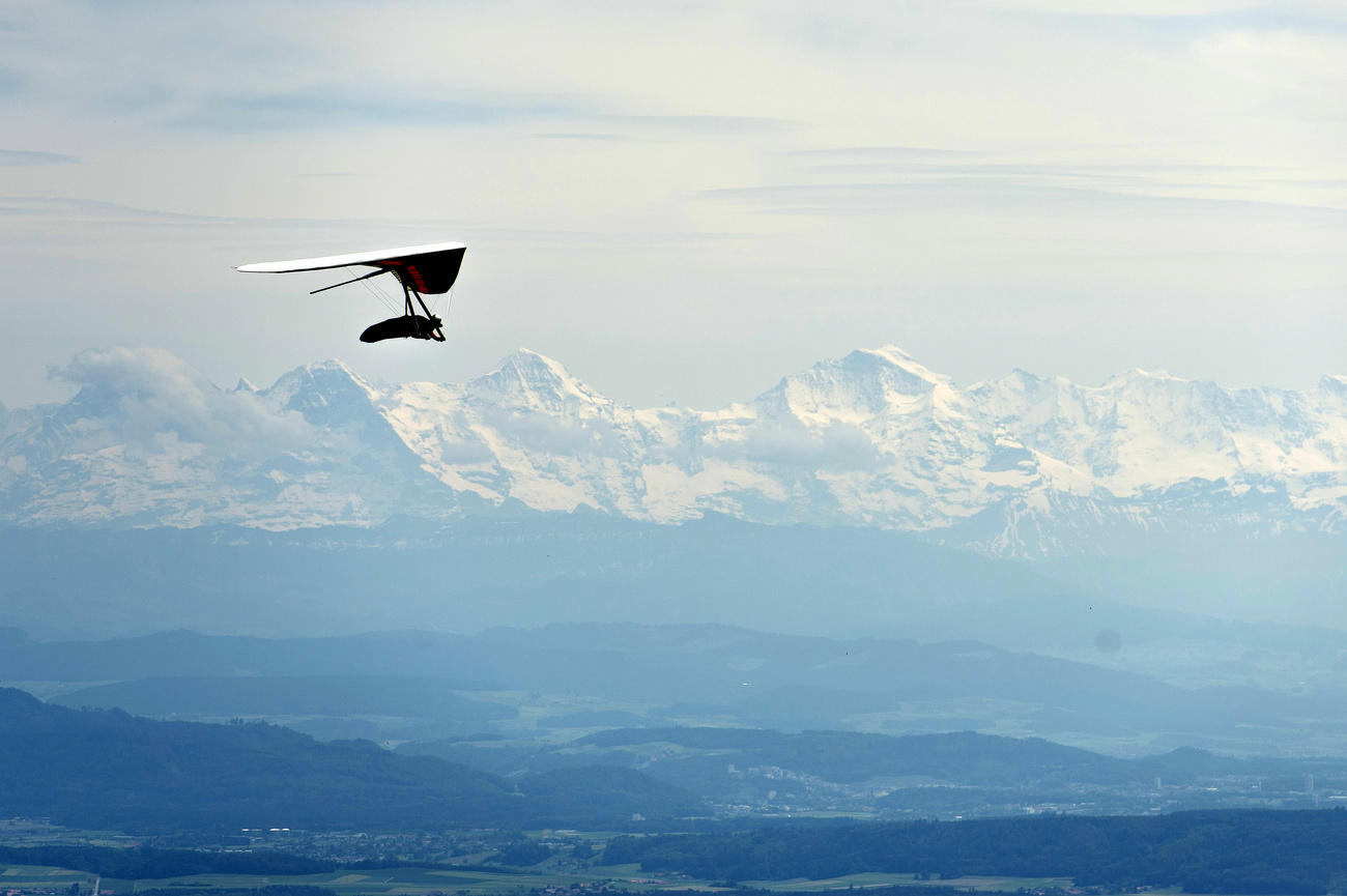 hang glider with mountains