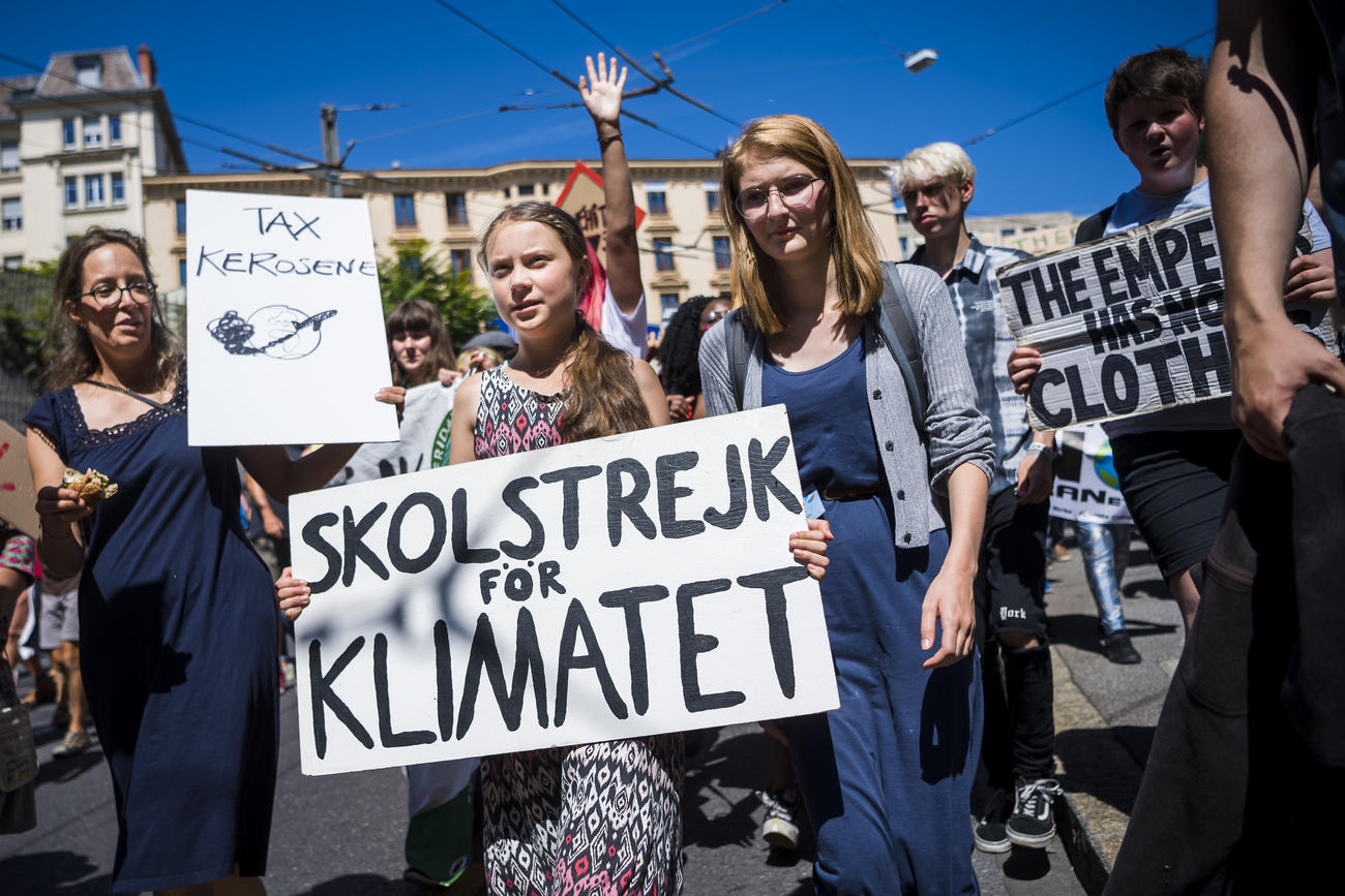 Greta Thunberg with other climate marchers in Lausanne