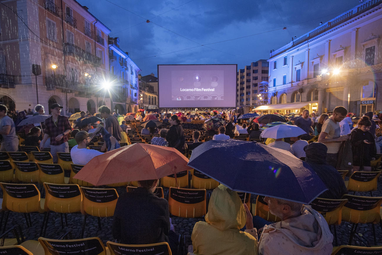 People watching an outdoor movie