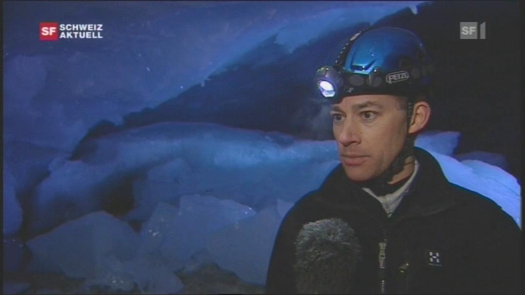 Geographer Oliver Strebler with helmet and had torch