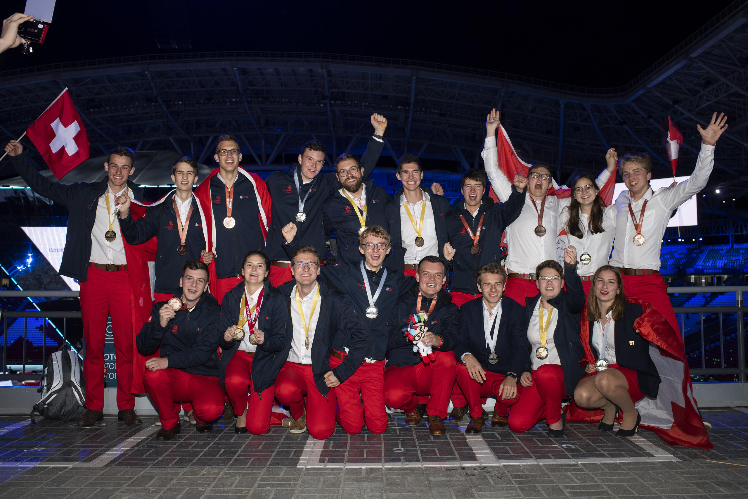 The medal winners celebrate their success in Kazan