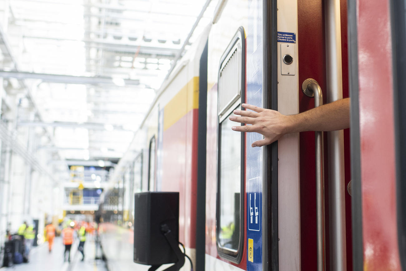 Hand in a train door