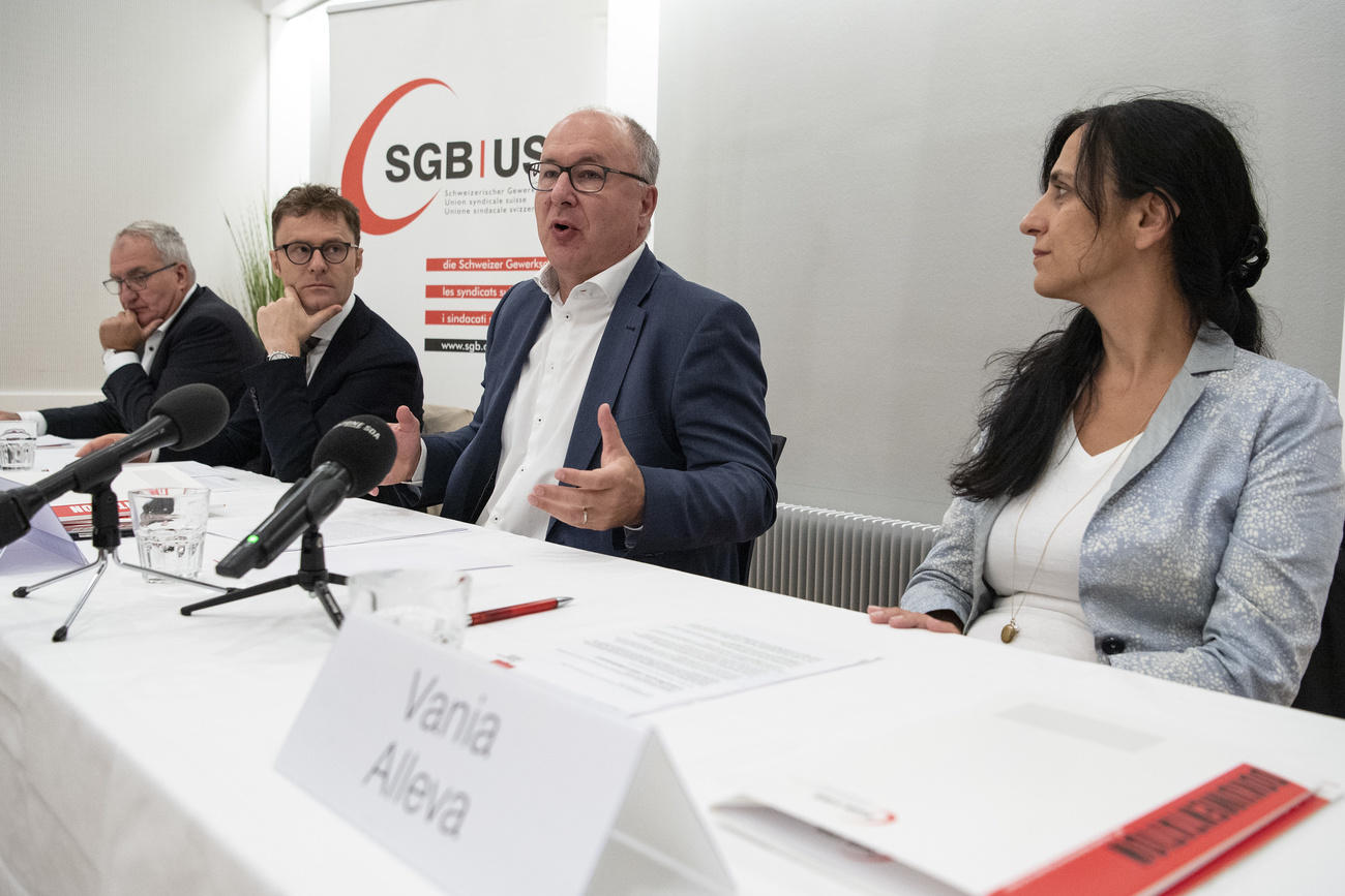 Member of the Trade Union Federation leadership at a table