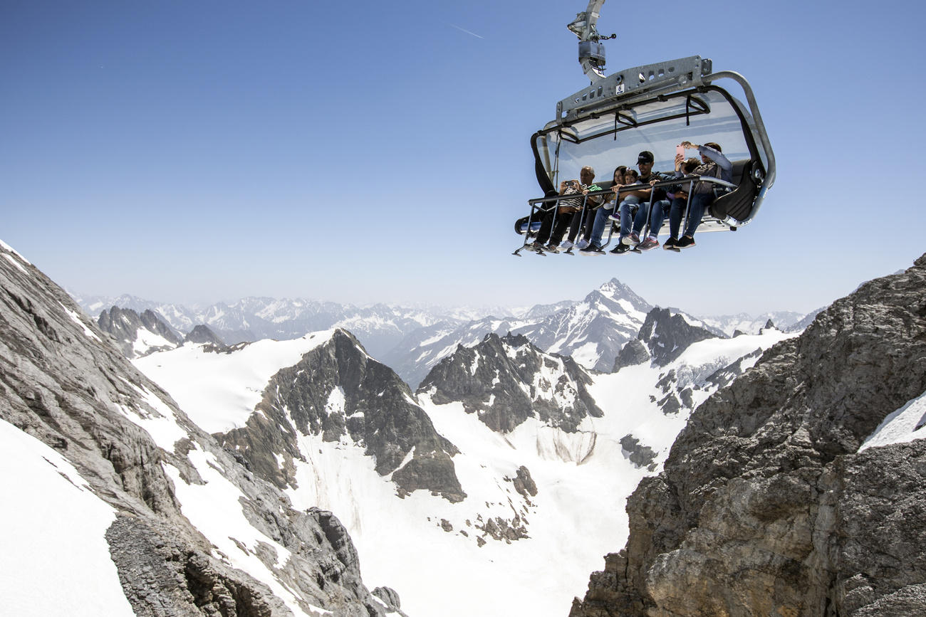 people enjoying snow in summer