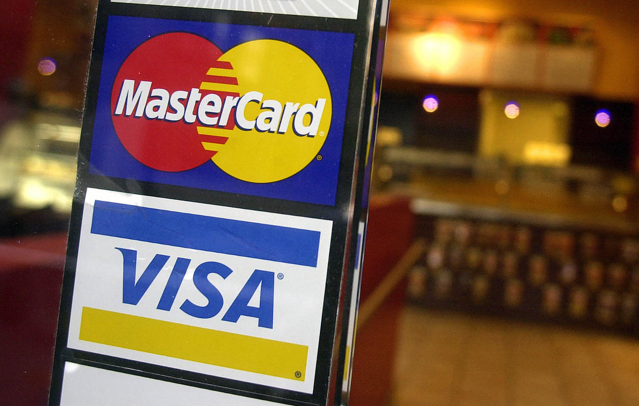 Mastercard and Visa signs