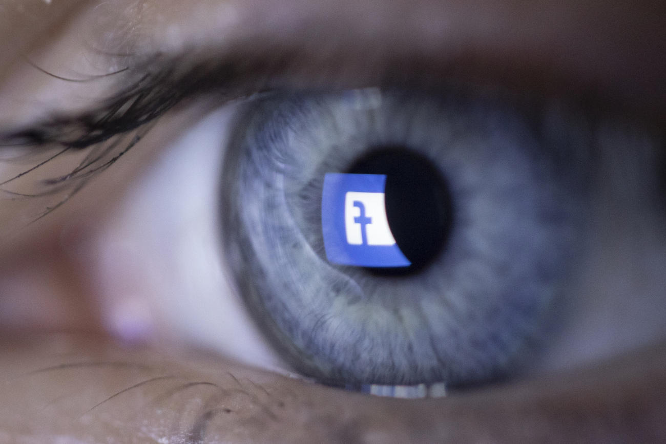 Someone looking at their Facebook page