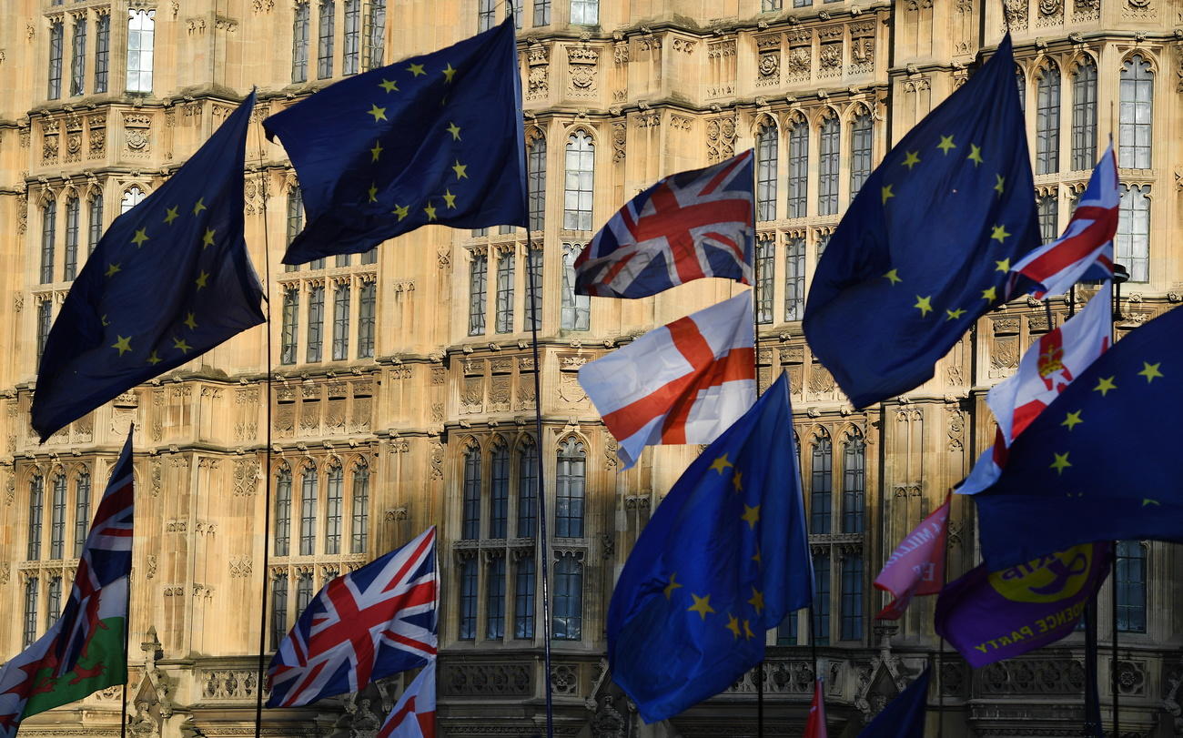 British and EU flags fly outside parliament in London