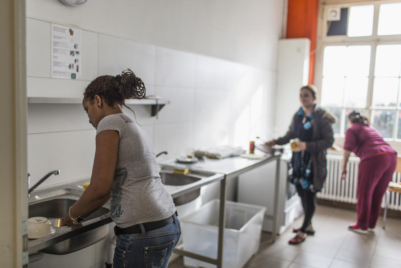 three women in a kitchen