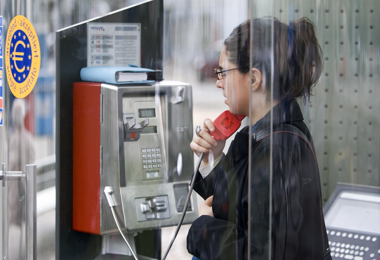 A woman in a call box