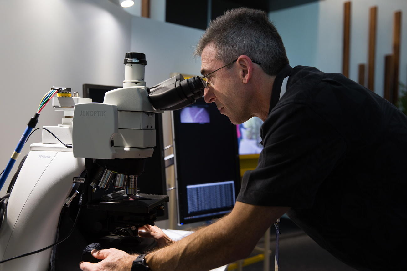 Man with microscope