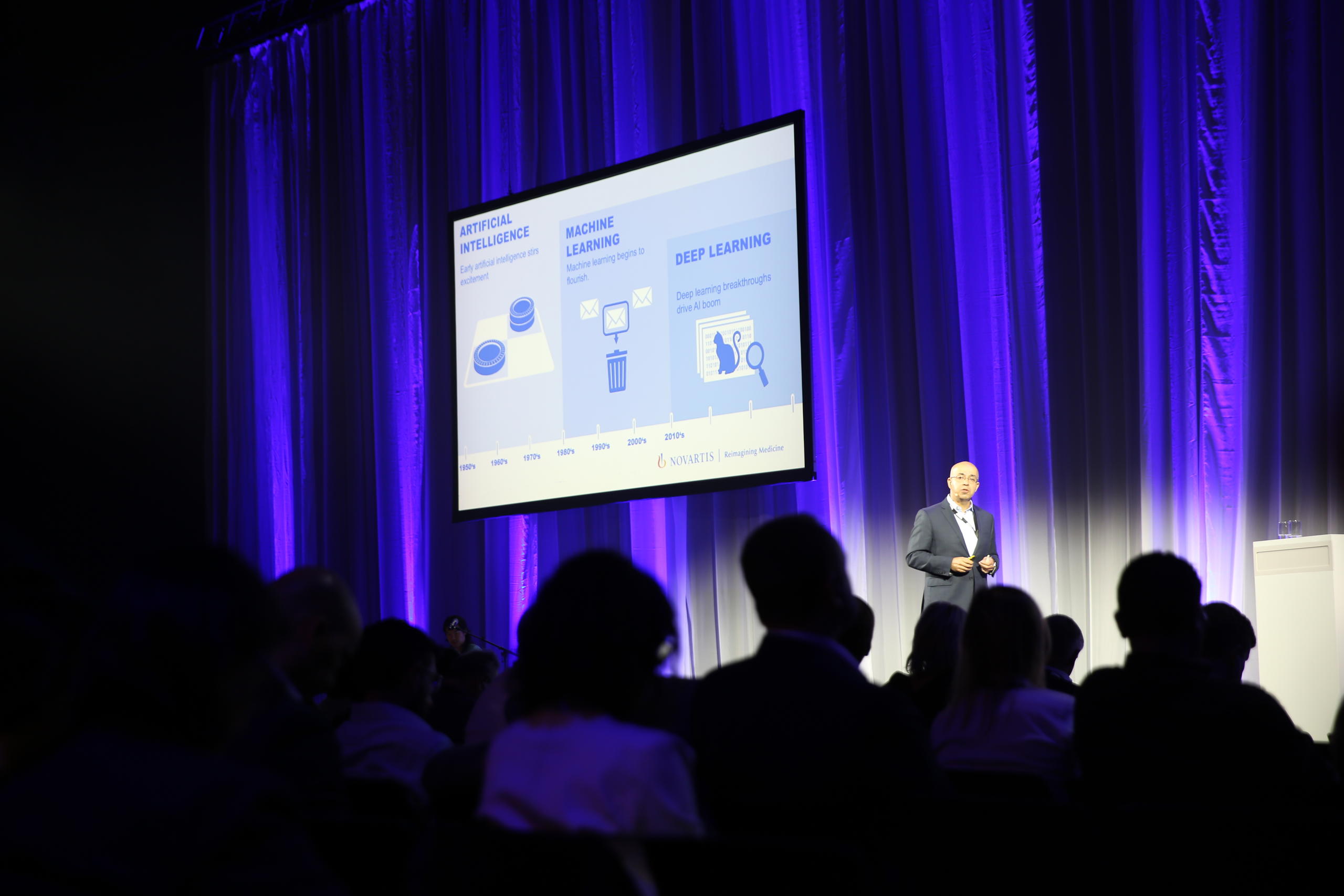Shahram Ebadollahi speaking at the Intelligent Health Summit Basel.