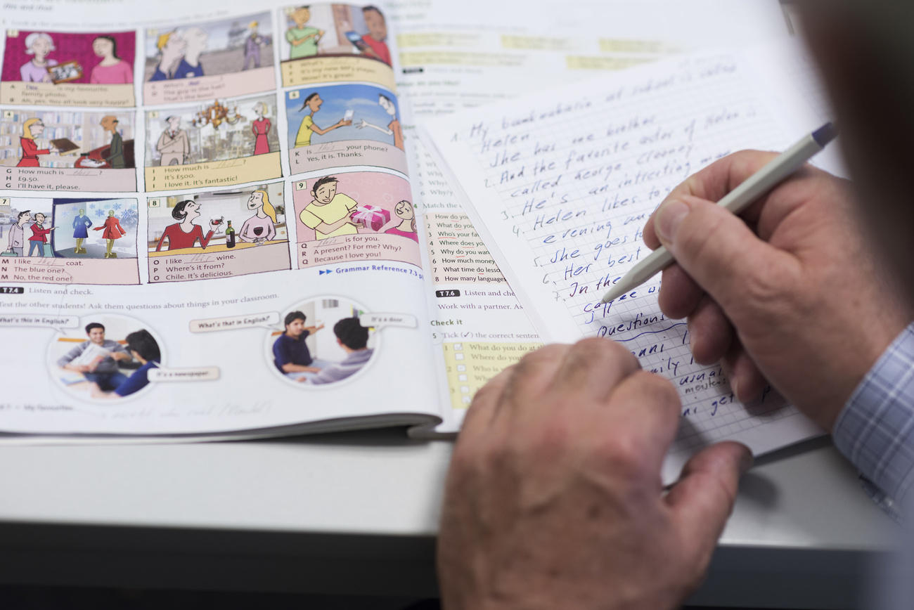 Man studying English book