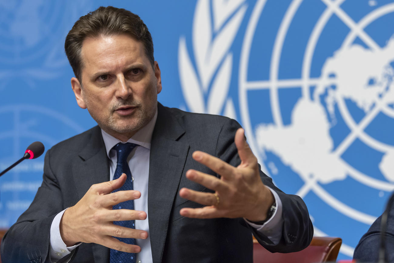 Pierre Krähenbühl in front of UN logo