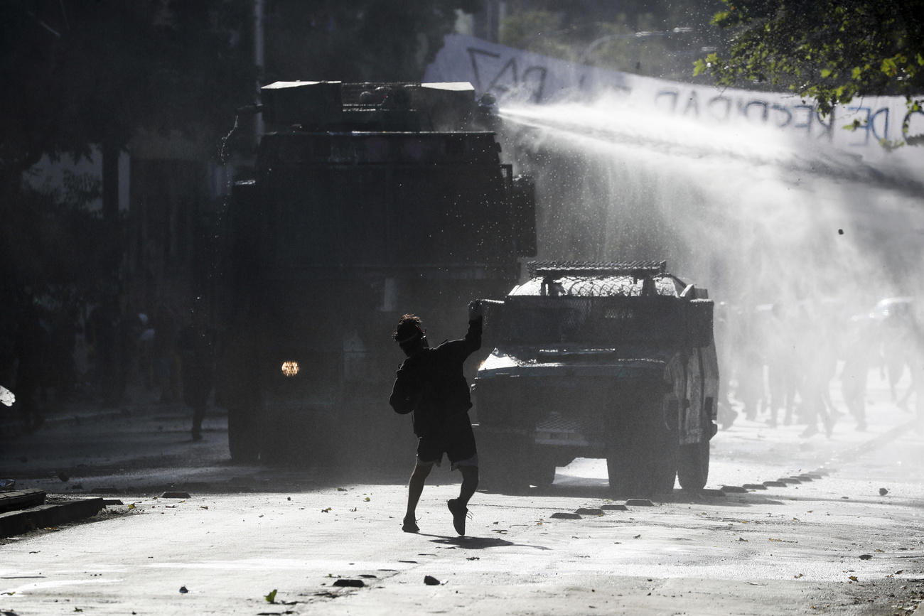 protestor throwing rock