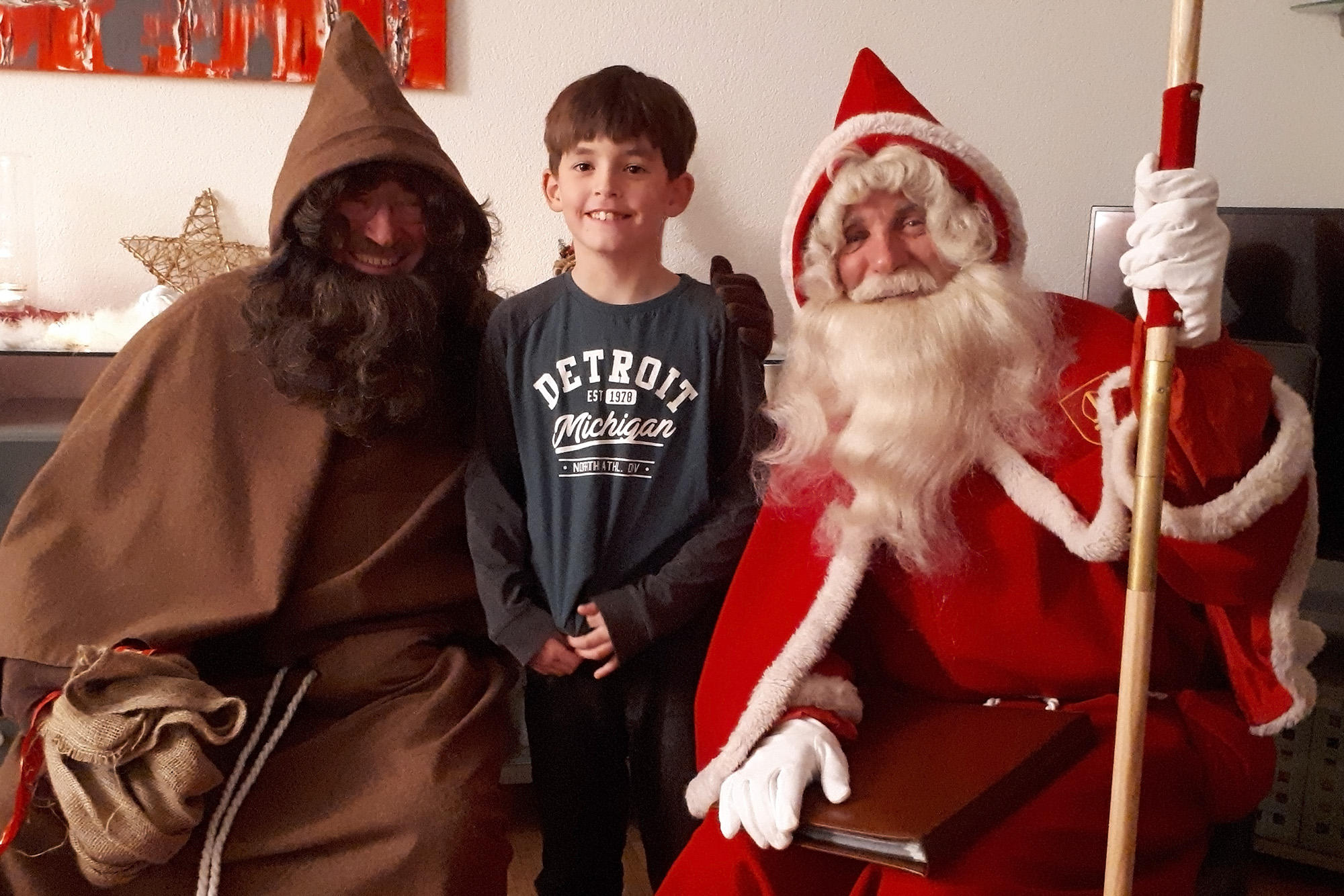 Samichlaus and Schmutzli with boy