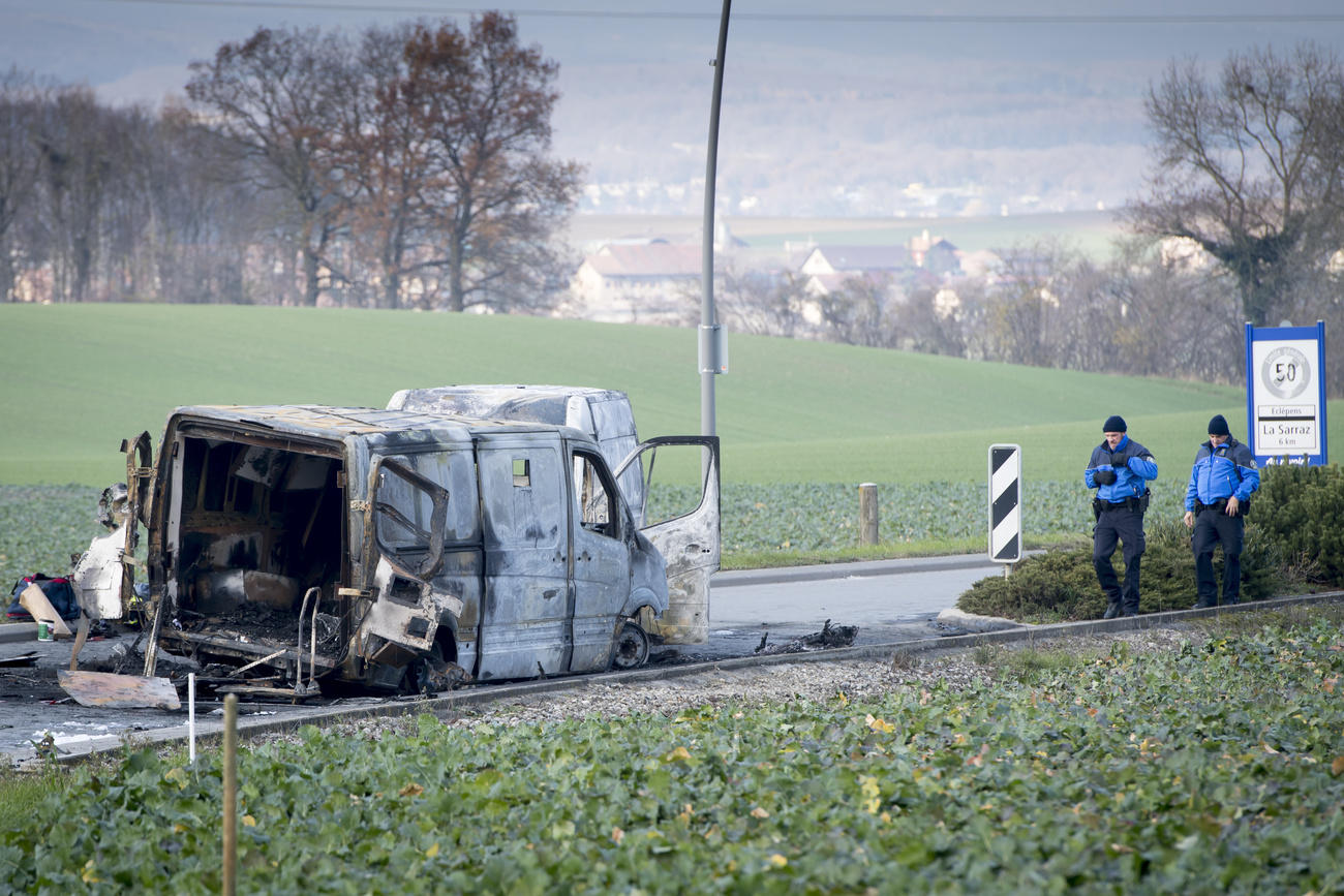 A burned out money truck at Daillens in canton Vaud