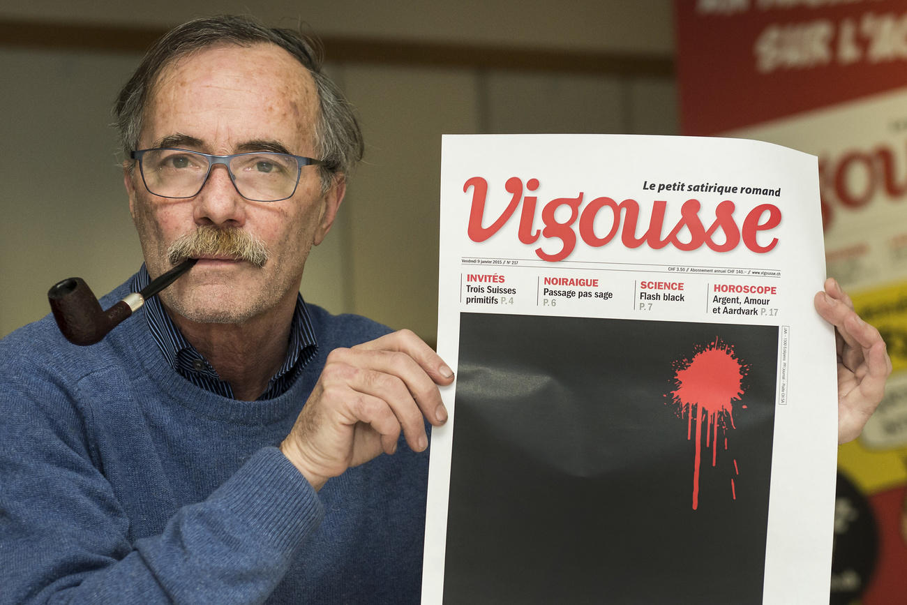 le dessinateur Thierry Barrigue avec la une de Vigousse du 7 janvier 2015
