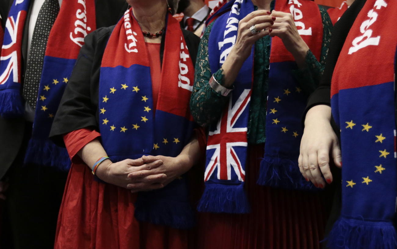 People wearing EU and Union Jack scarves