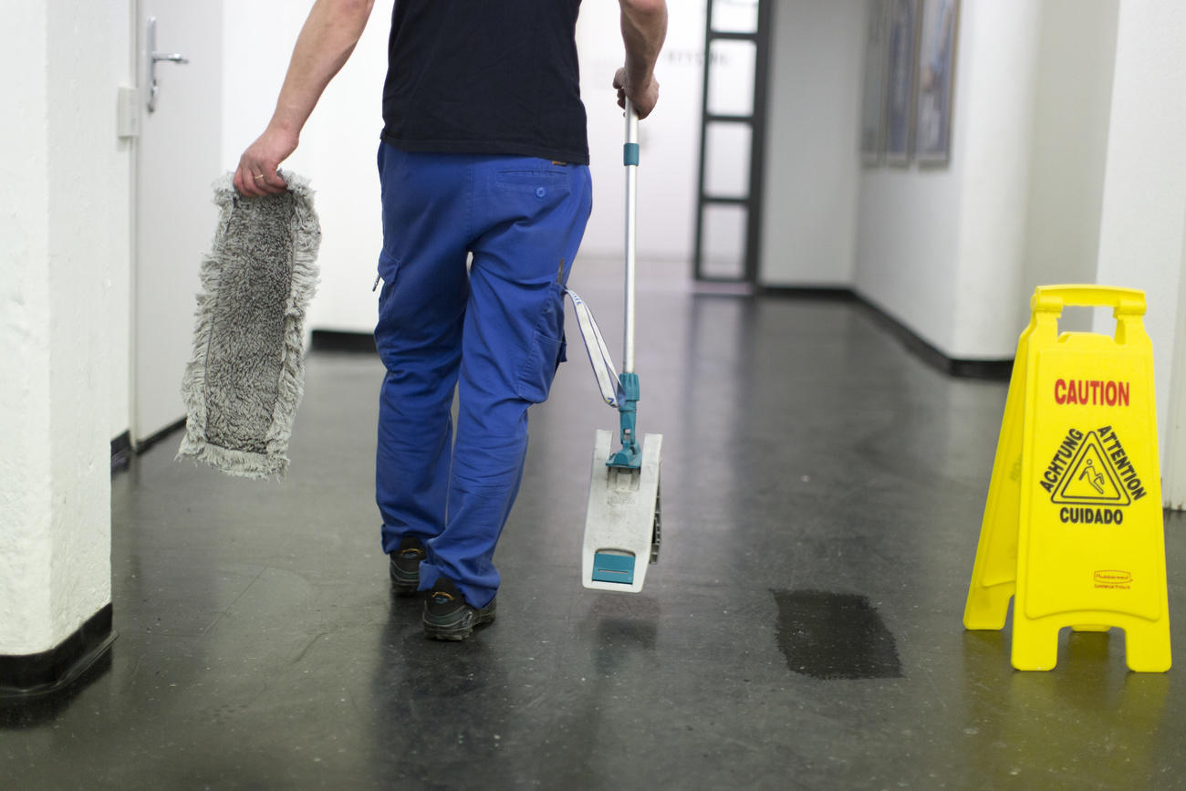 Man cleaning a floor