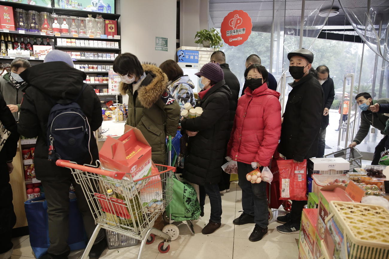 People in masks shopping