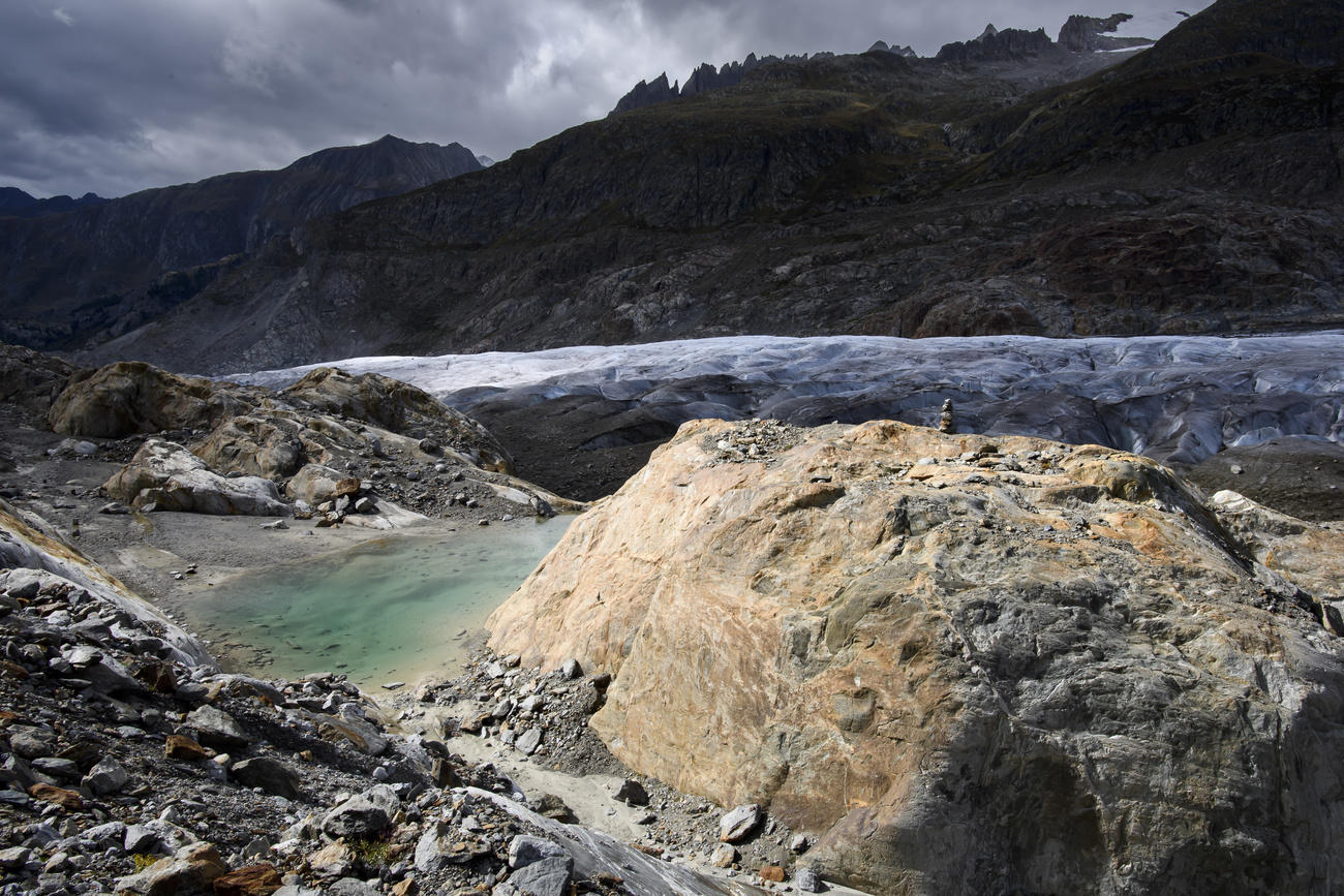 Glacier melts into a lake