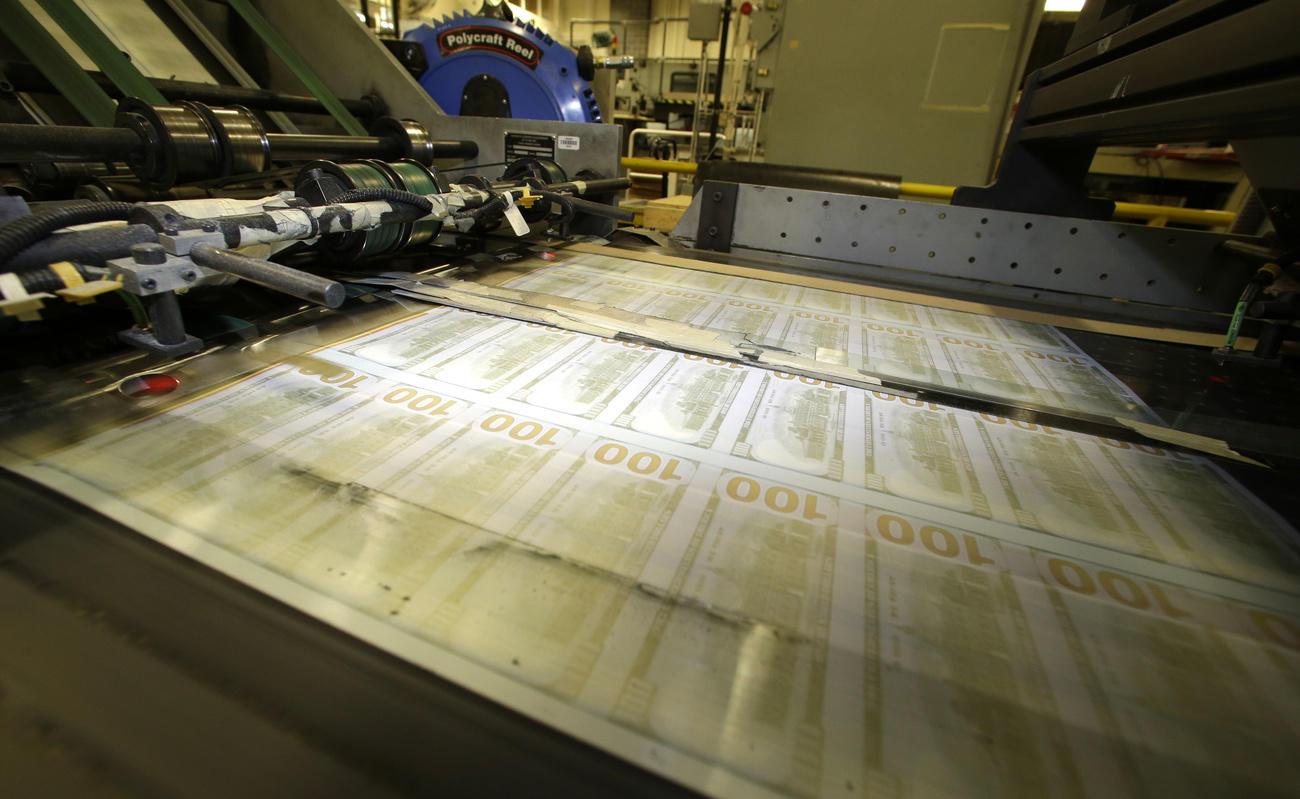 Dollar bills being printed
