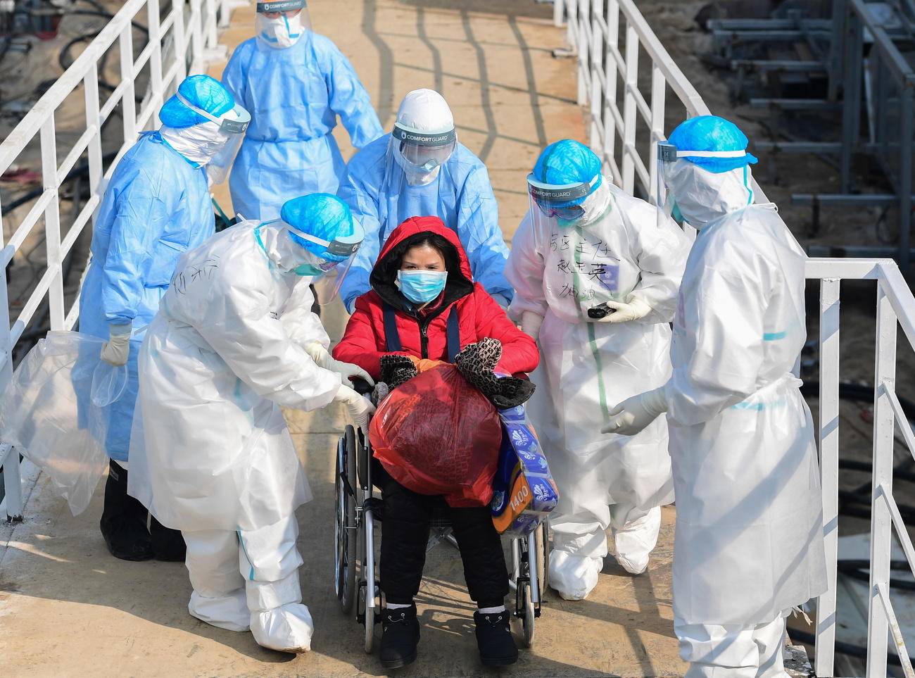 Medical staff transfer patients to the newly completed Huoshenshan temporary field hospital in Wuhan