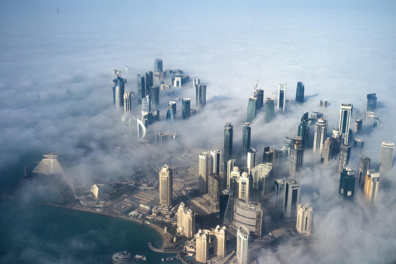 Doha skyline shrouded in clouds