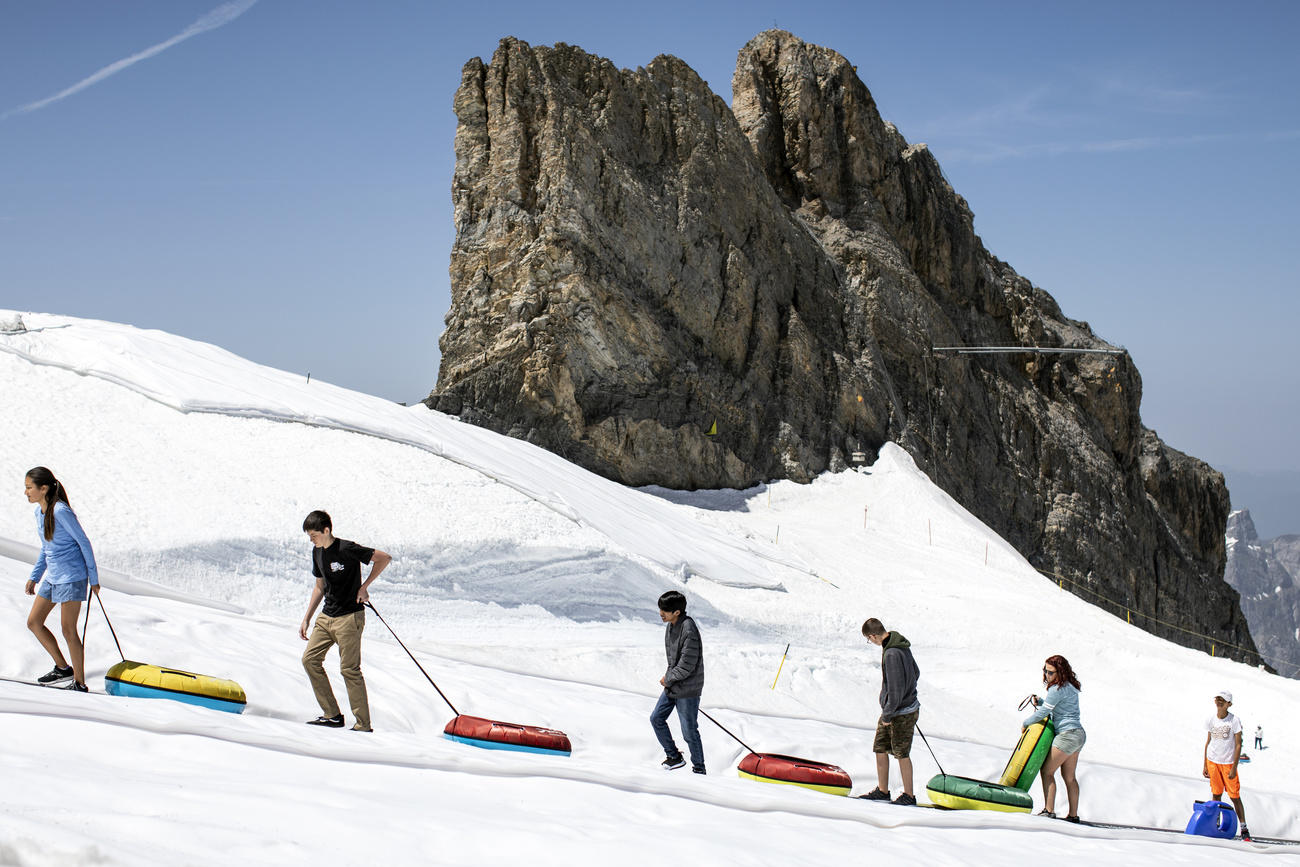 Tourists on the Titlis mountain in central Switzerland on June 26, 2019.