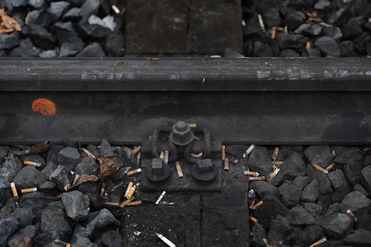 cigarette butts on train tracks