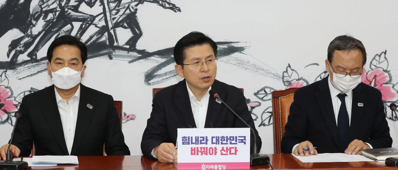 politicians, two wearing face masks