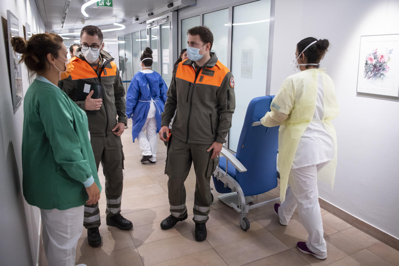 Masked people at a hospital