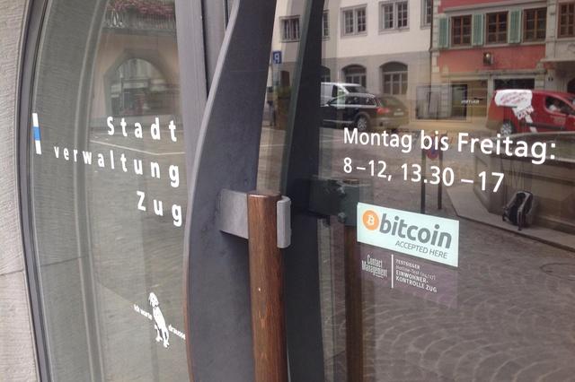 Bitcoin accepted sign on council office doors