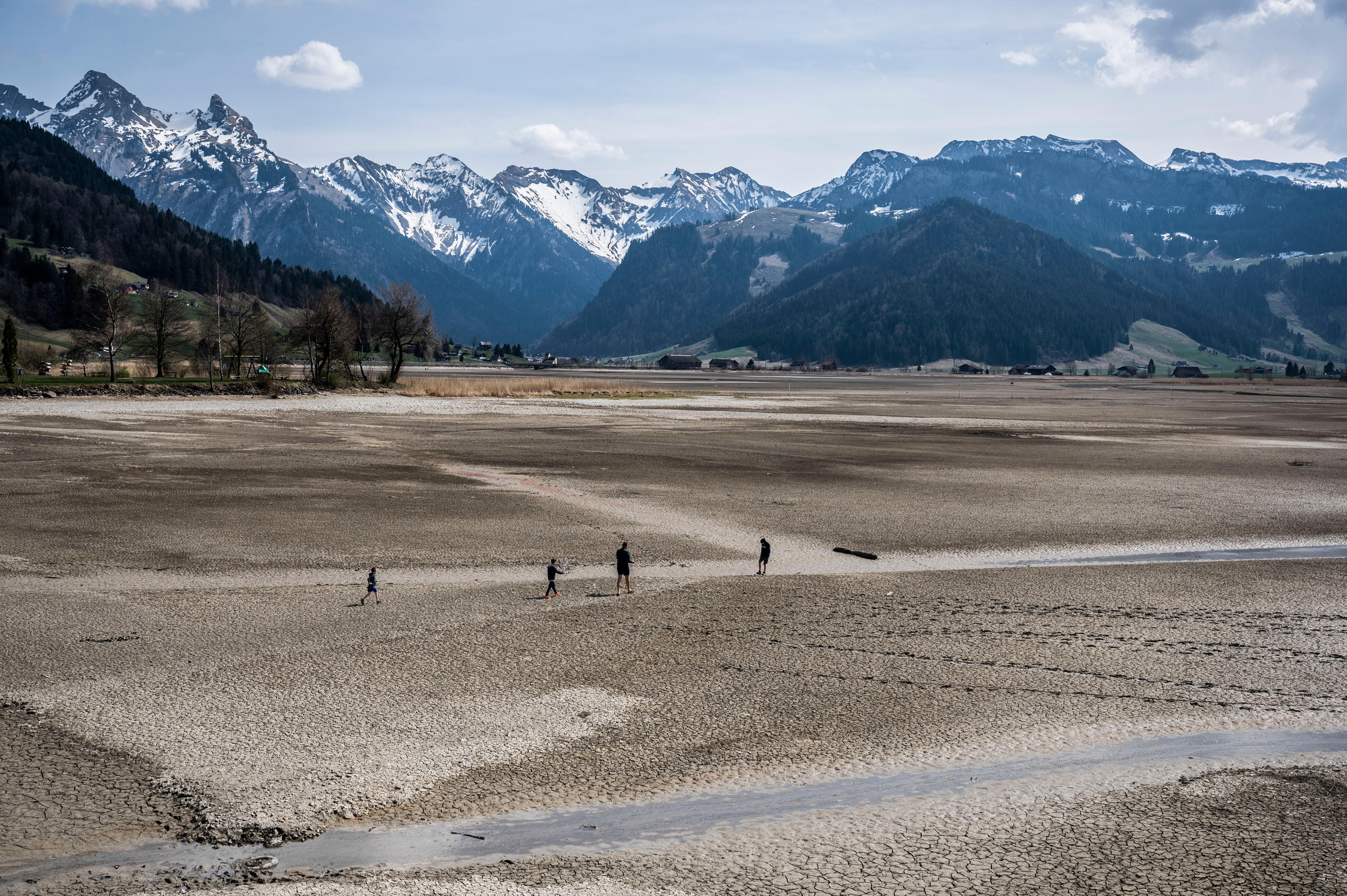 People walking river bed