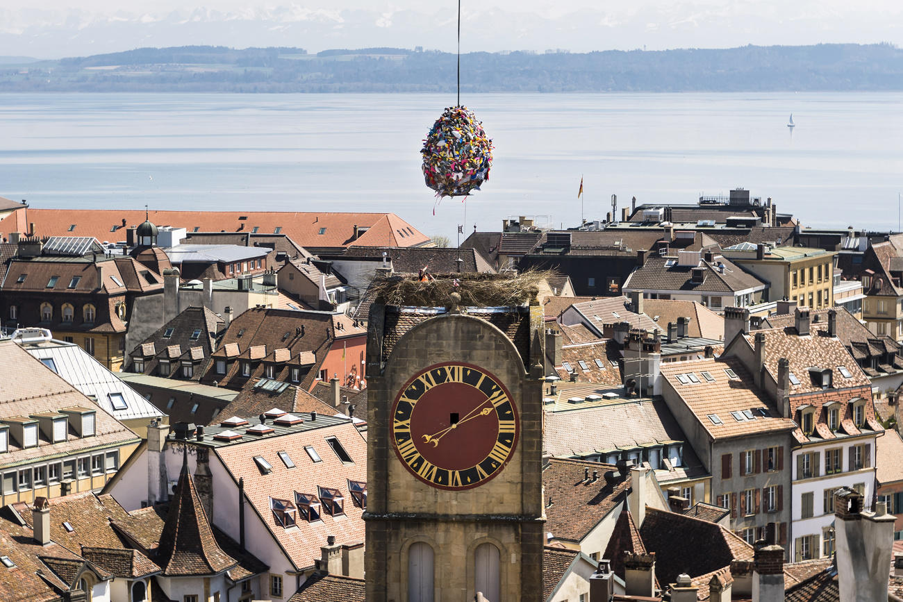 Egg suspended over a clock tower