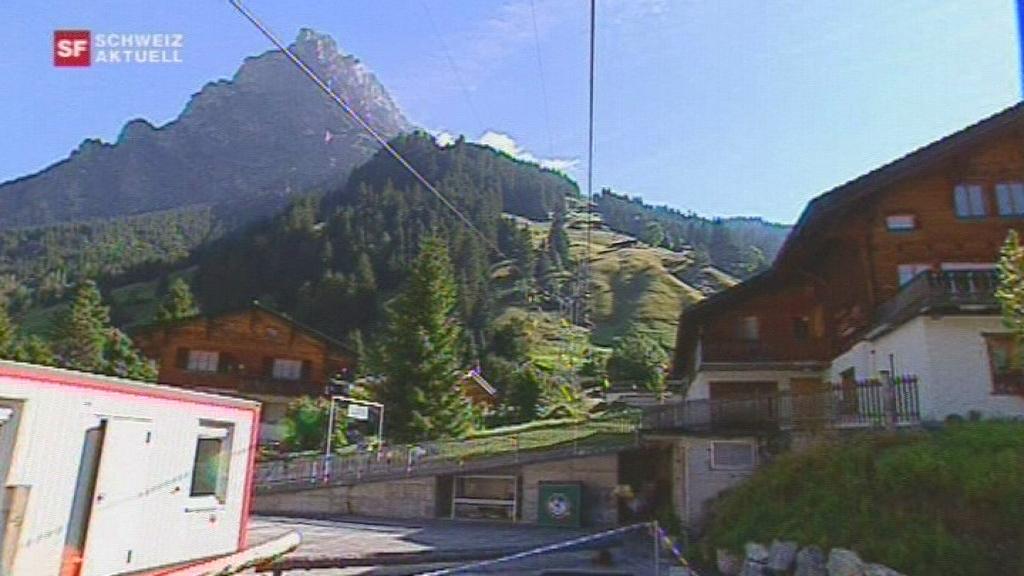 Mountain village with cables of a cable car