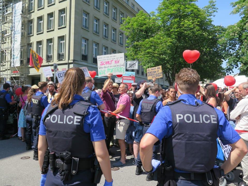 Police watch demonstrators