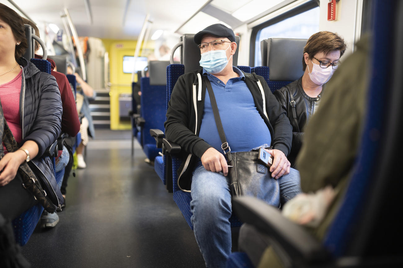 train passengers with masks