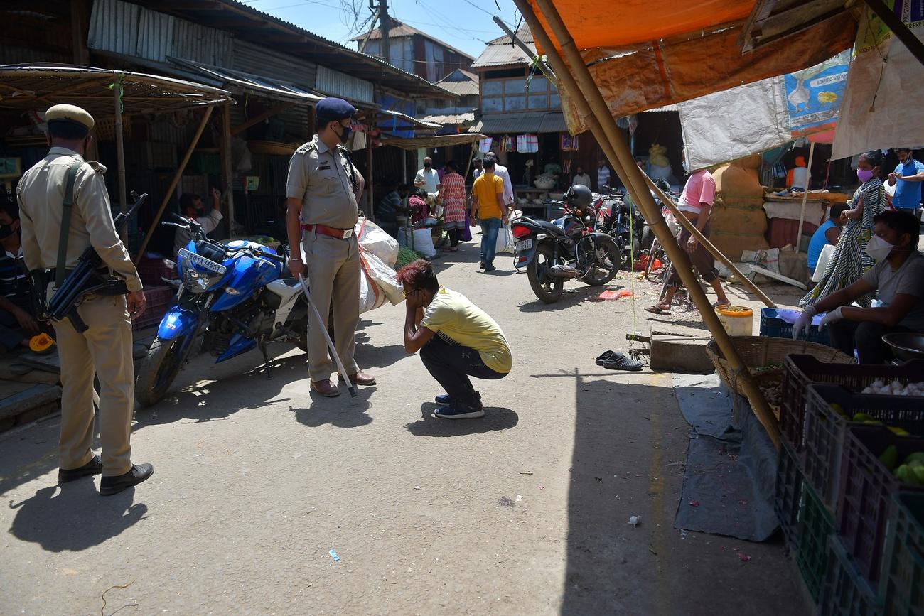 Indian police enforcing the law