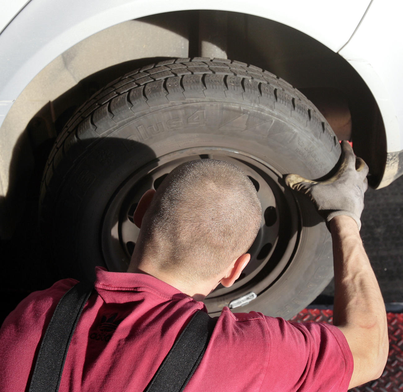 man changing tyre