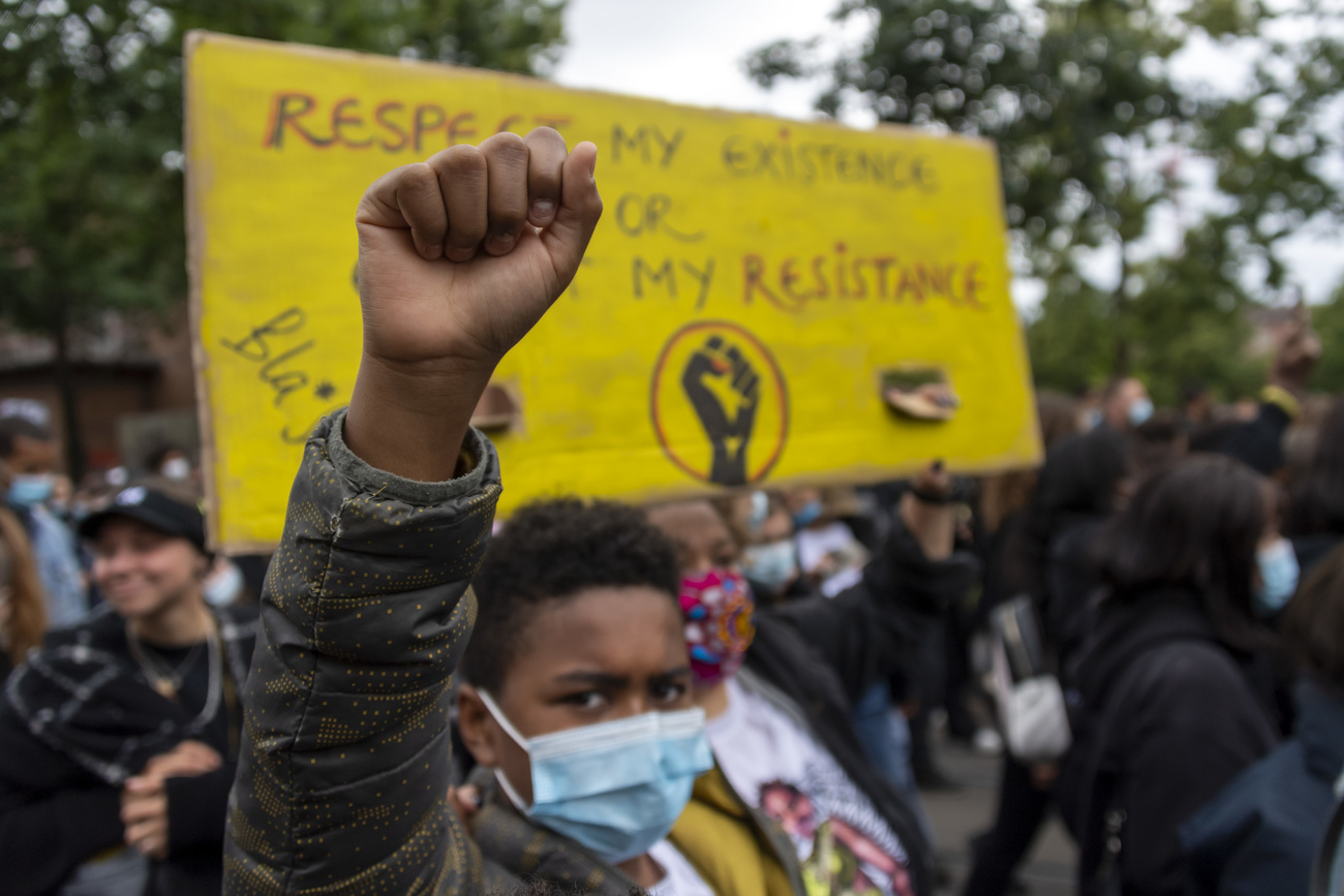 People take part in a Black Lives Matter demonstration in Basel