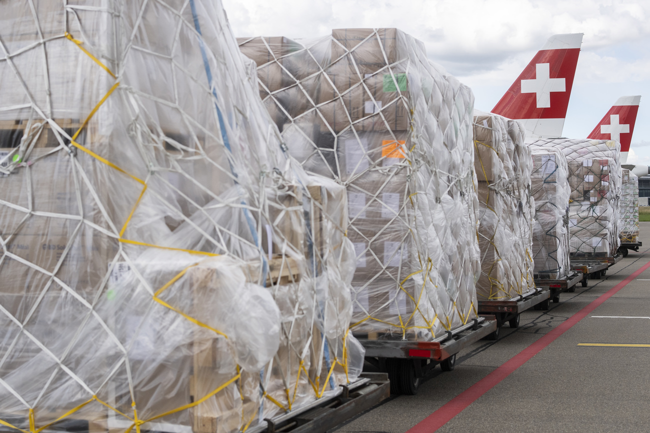 The relief supplies wait to be loaded onto a cargo plane at Zurich Airport