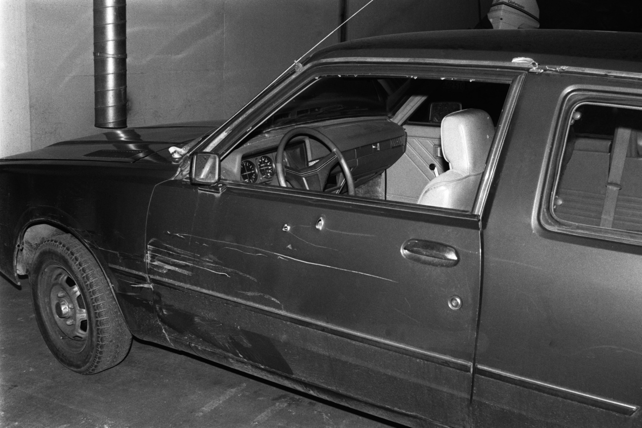 Bullet-ridden car