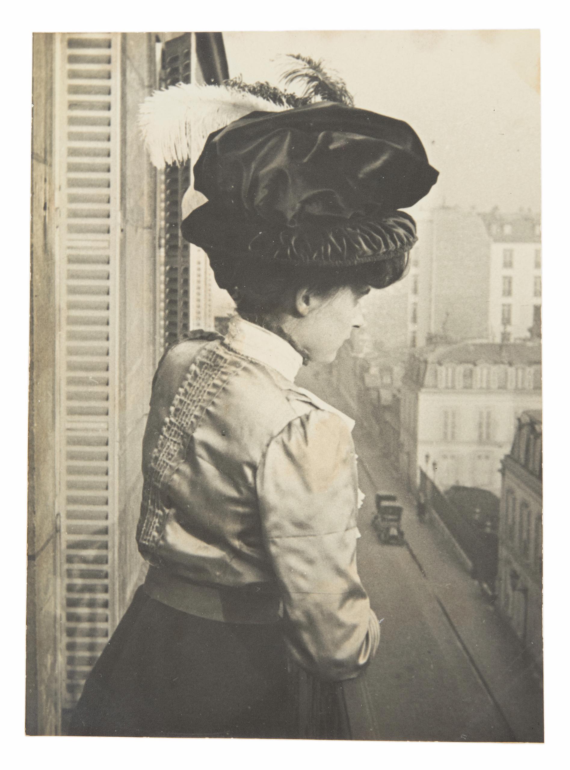 Woman wearing a hat.