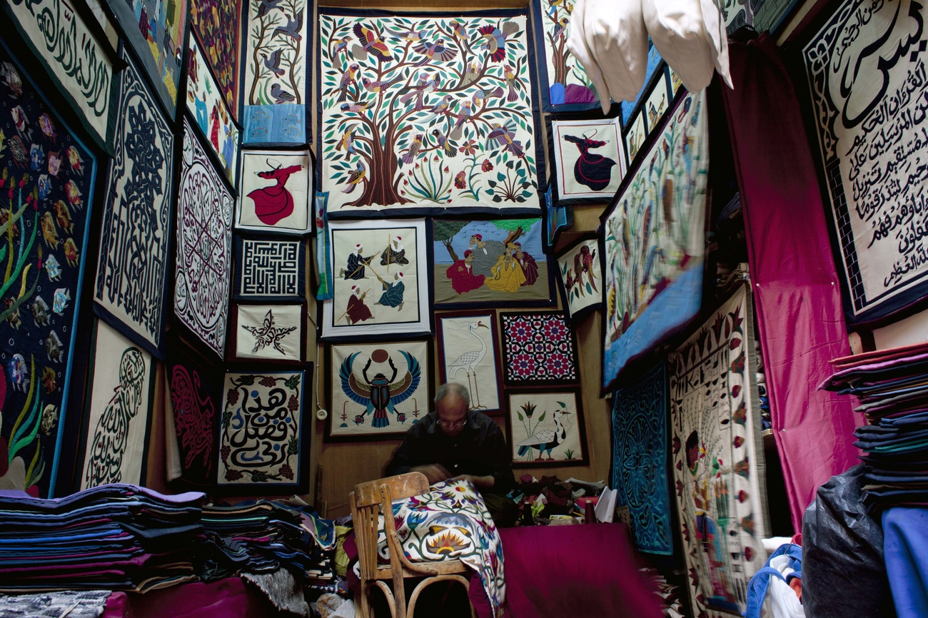 Artisan making rugs in Egypt