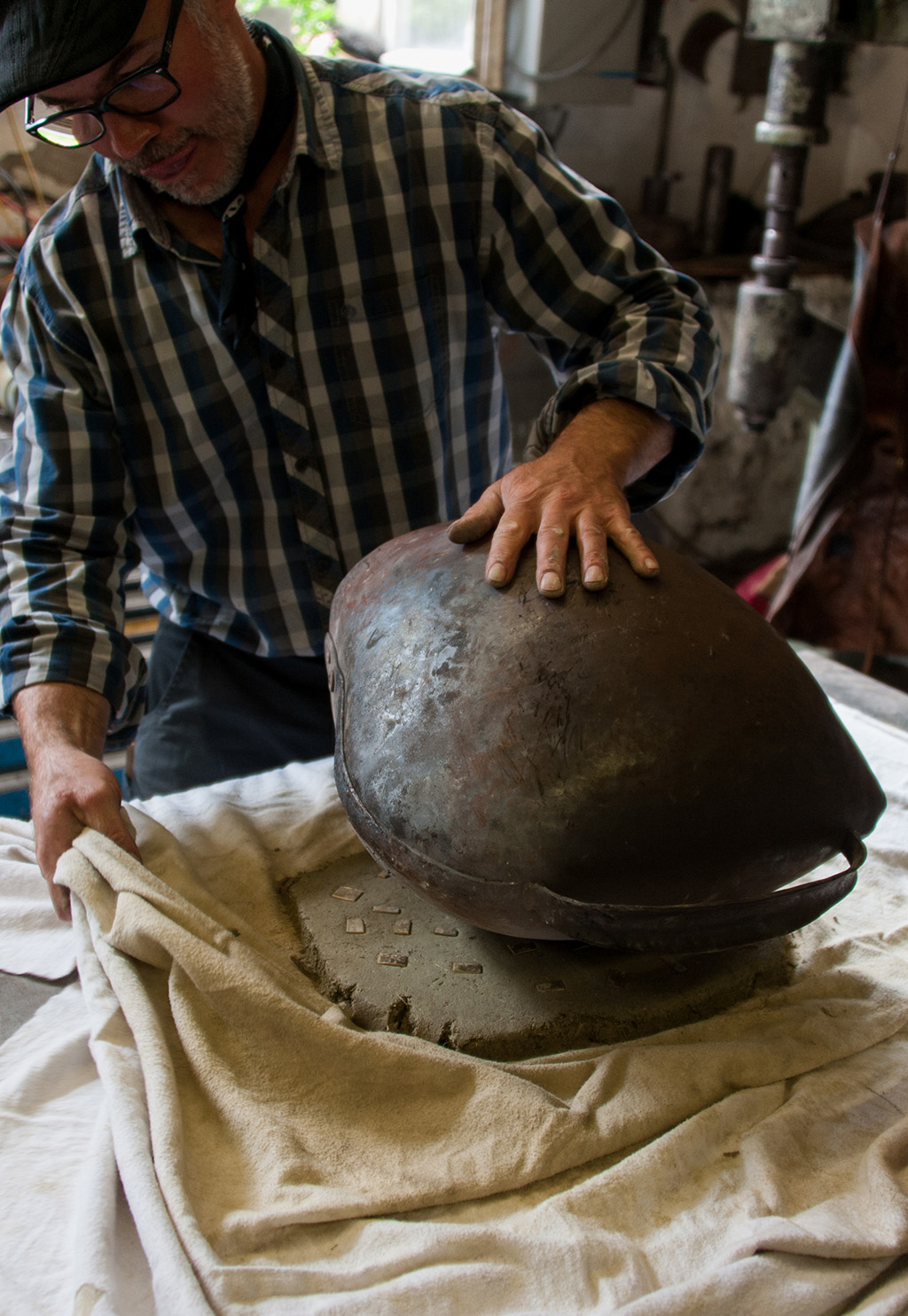 Peter Preisig prepares to make a bell.